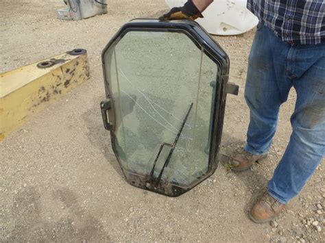 skid steer rear window replacement|caterpillar 262b front door window.